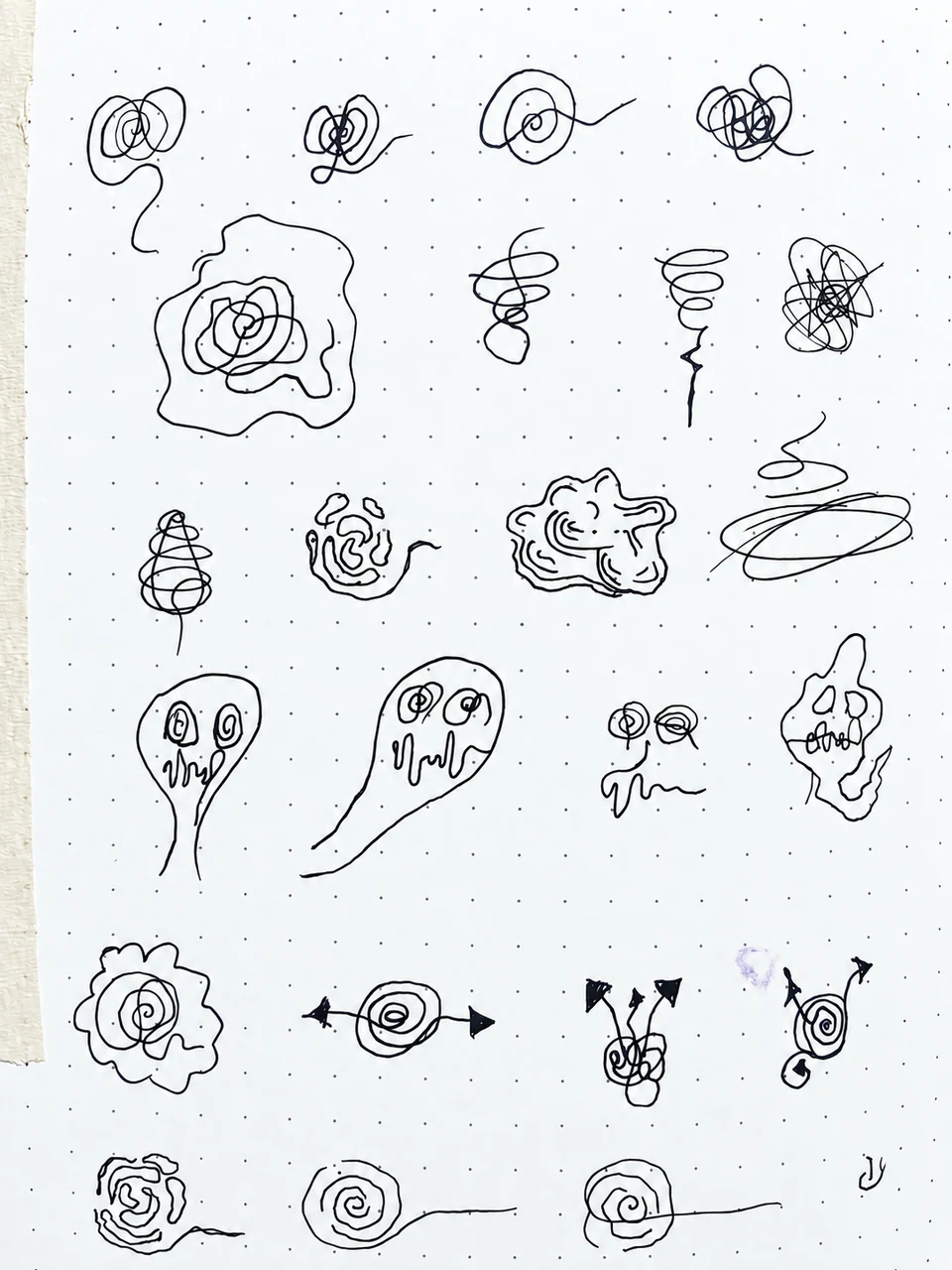 Notebook page showing early sketches for the Anxiety identity
